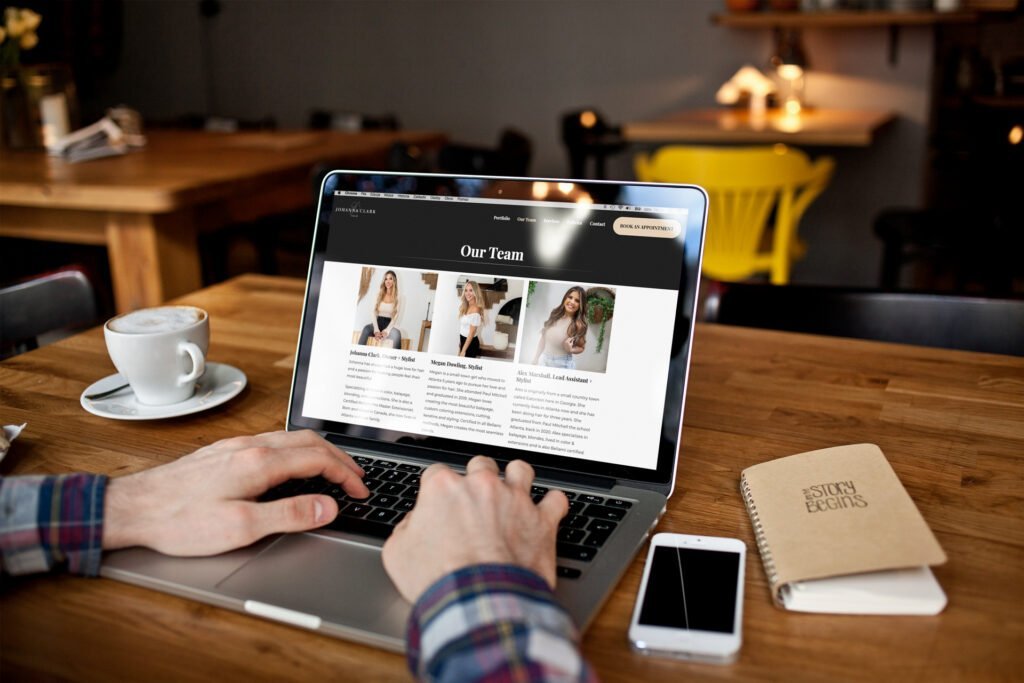 Johanna Clark Hair website displayed on a laptop in a cafe